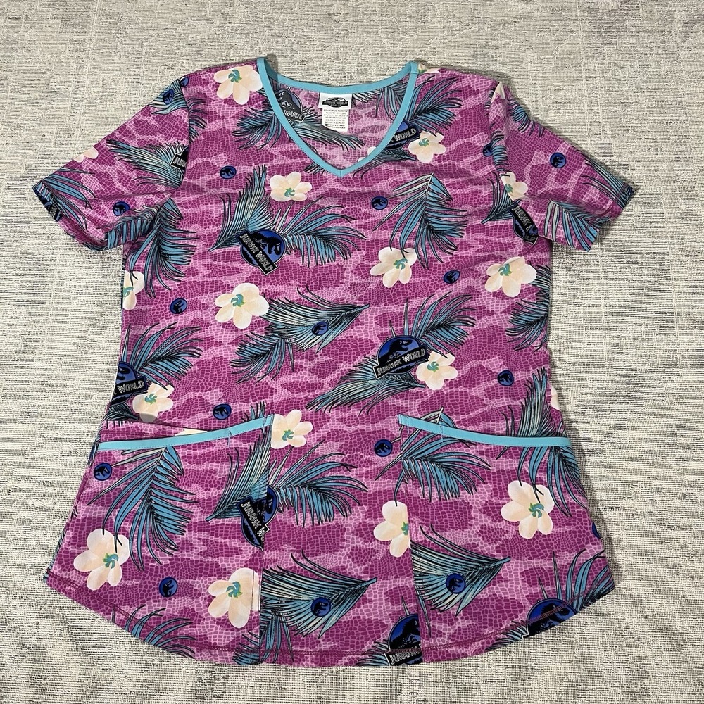 Jurassic World Dominion Women's Scrub Top Shirt Size Small Pink Dinosaurs
